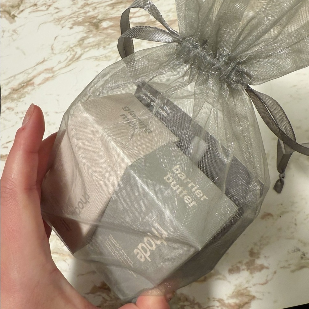 RHODE Skincare Essentials in Silver Bag - Picture 2 of 4